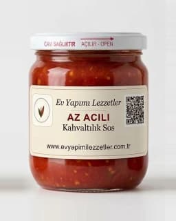 Ev Yapımı Lezzetler etiketli cam kavanozda az acılı kahvaltılık sos
